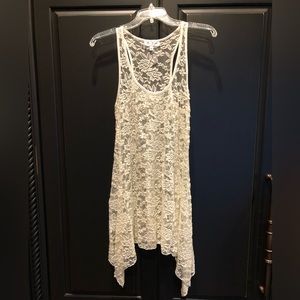 New sleeveless lace blouse.